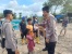 Wujud Peduli Polri, Polsek Batu Aji Bagika Takjil di TPS Tanjung Uncang
